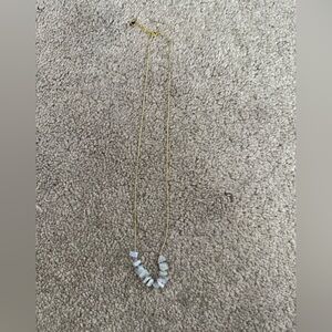 Elegant Gold and White Necklace